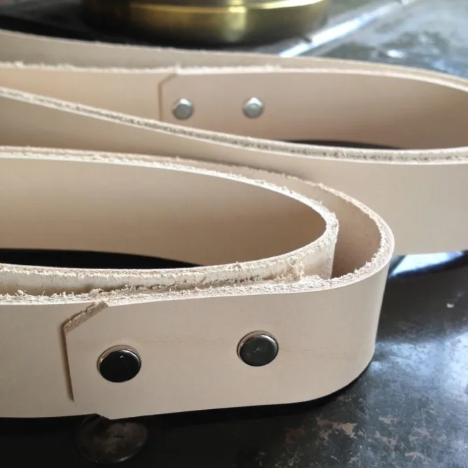 Unstained leather strapping