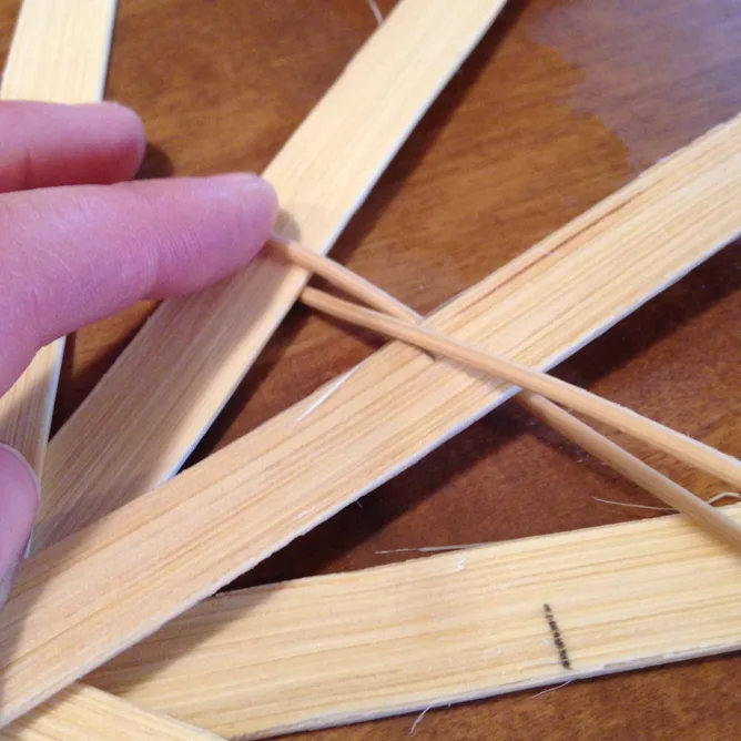 Top twiner woven behind the next stake