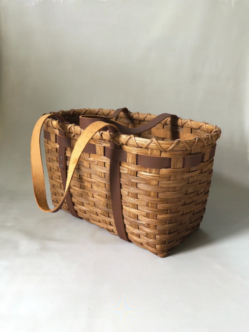 A Leather Handled Tote in aged oak